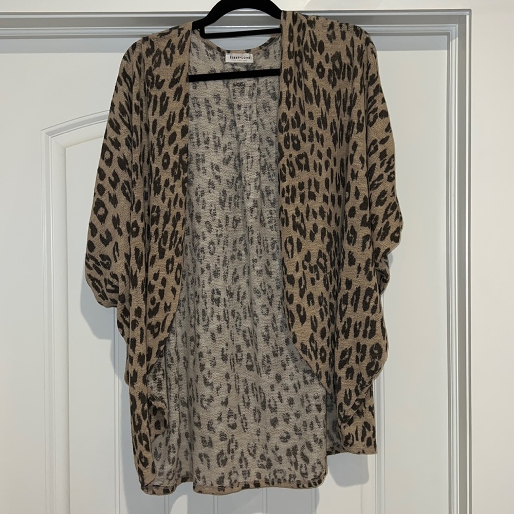 Light weight leopard print poncho.